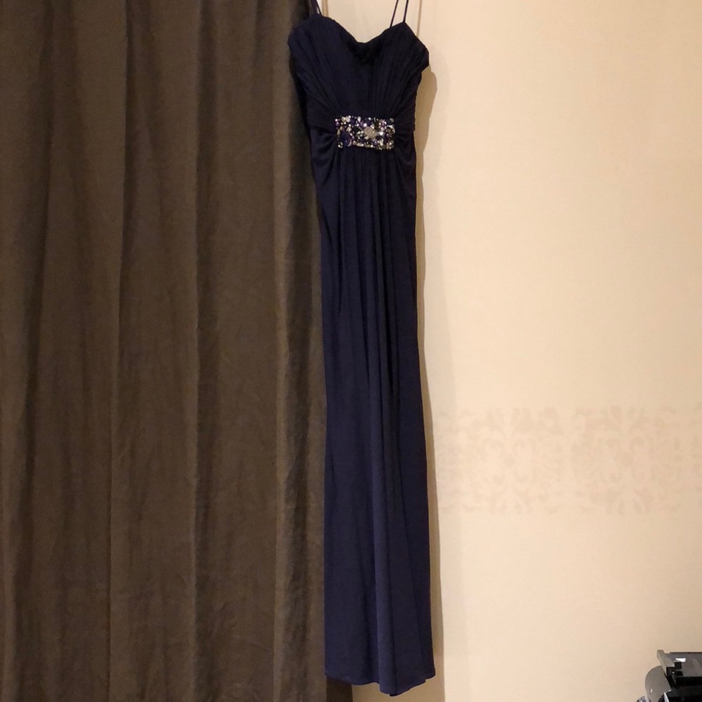 Plum gown with stone embellishment